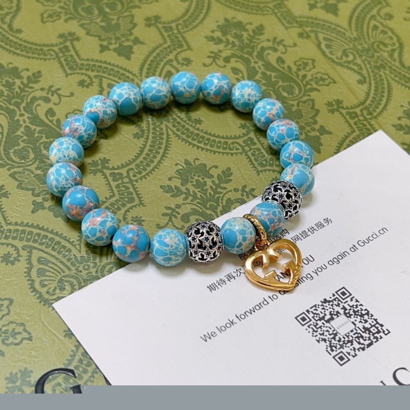 G*u*i bracelets